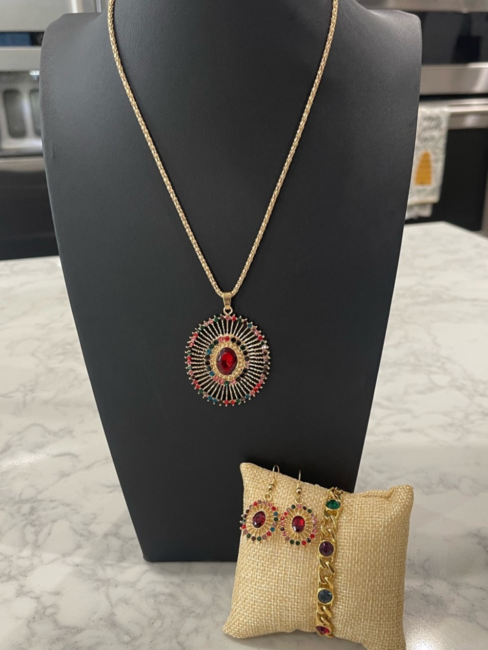 Gold-Tone Red Multi-Stone Sunburst Pendant Necklace, Bracelet and Earring Set